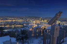 Photo of landscape with mountains, river and buildings in Lillehammer town, Norway.