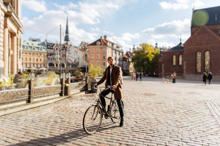 Young man riding a bike, Stockholm, Sweden.