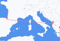 Fly fra Tirana til Pamplona