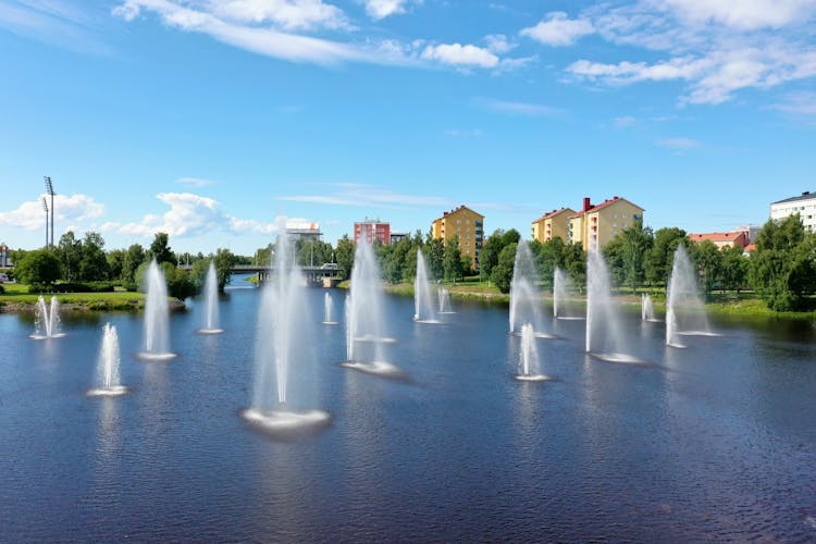 Photo of Oulu Finland fountains in park.