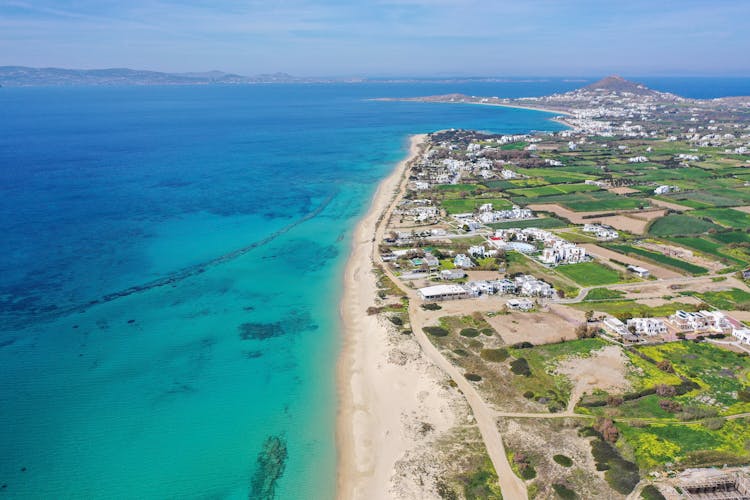 Photo of aerial view of beautiful Plaka beach in Naxos Island, Cyclades, Greece.