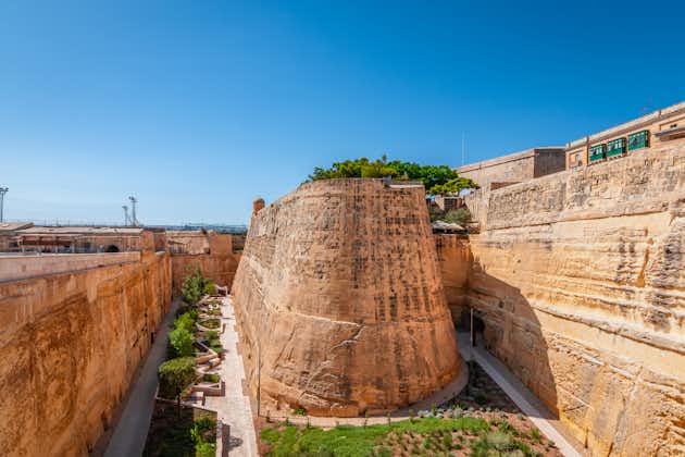 Photo of ancient Fortification Wall at City Gate of Valletta, Malta.