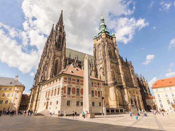 Photo of St. Vitus Cathedral at Prague Castle in Prague under Clear Blue Sky Sunny Summer. Full of Tourist people, Czech.
