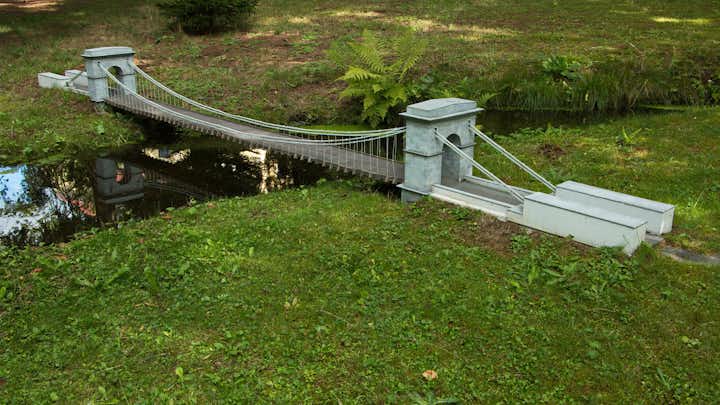 Photo of Miniature of Stádlec chain Bridge in miniature park Boheminium near Mariánské Lázně, Plzeň Region, Czech Republic.