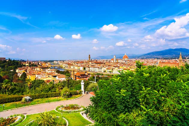 photo of florence or firenze cityscape. Panorama view from michelangelo park square. Ponte vecchio bridge, Palazzo vecchio and duomo cathedral. Tuscany, Italy.