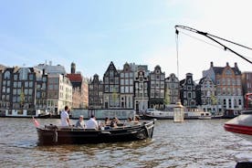 Amsterdams kanalkryssning på en liten öppen båt (max 12 gäster)