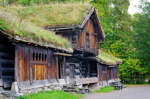 Photo of Traditional Norwegian House with grass roof in the Norwegian Museum of Cultural History, Oslo, Norway.