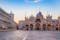 Photo of sunrise in San Marco square with Campanile and San Marco's Basilica, the main square of the old town, Venice, Veneto Italy.