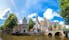 photo of Oude Kerk (Old Church) and Voorburgwal canal in Amsterdam.