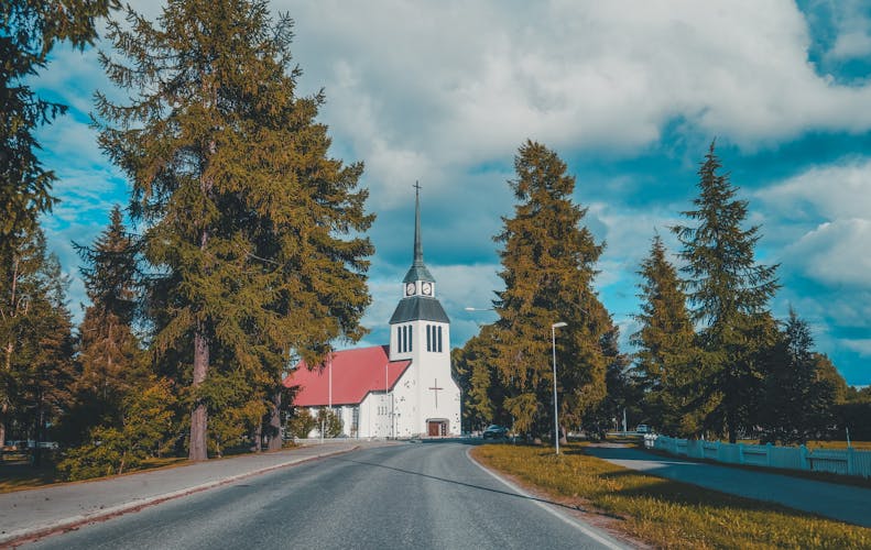 Photo of the church of Kuusamo in northern Finland on a summer day.