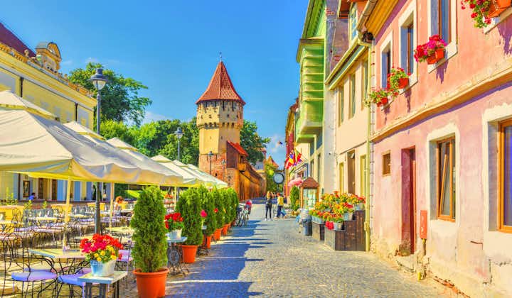 Little square and The Carpenters' Tower in Sibiu city, Transylvania region, Romania.