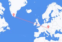 グリーンランドのカコルトク出身から、オーストリアのウィーンまでのフライト