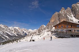 photo of the romantic, Snow covered Skiing Resort of Cortina d Ampezzo in the Italian Dolomites seen from Tofana with Col Druscie in the foreground.