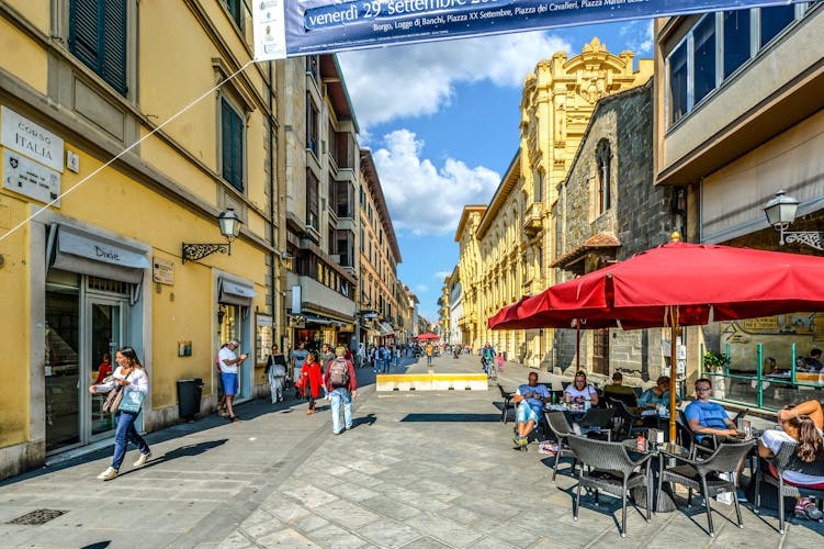  Tourists and locals enjoy a sunny day on the Corso Italia, the main shopping and dining street through the Tuscan city of Pisa, Italy.