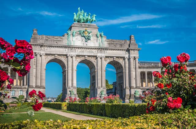 Photo of Parc du Cinquantenaire with the triumphal arch. Brussels, Belgium.