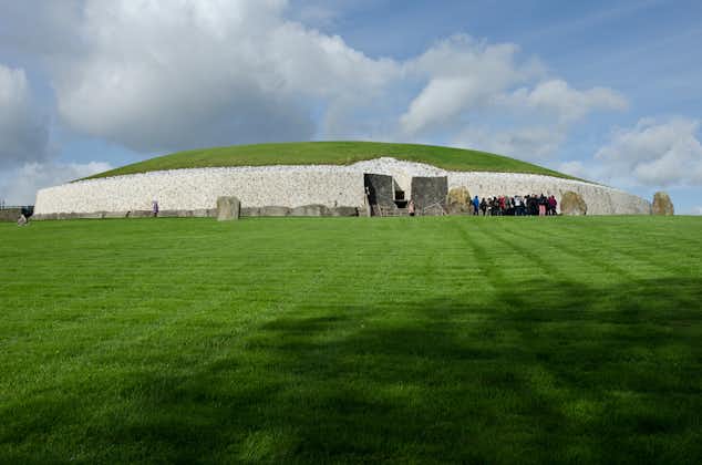photo of view of Newgrange Stone Age Passage Tomb in Boyne Valley, Ireland.