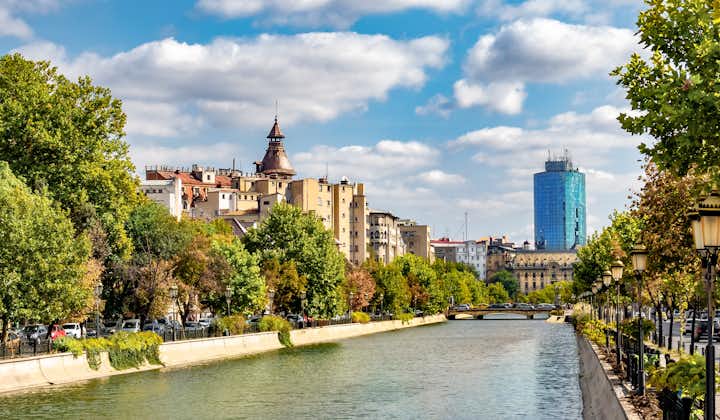 Cityscape view across Dambovita river city of Bucharest.