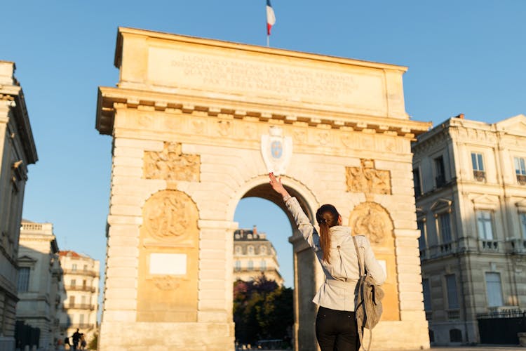 Photo of woman in historical city Montpellier in France, South Europe.