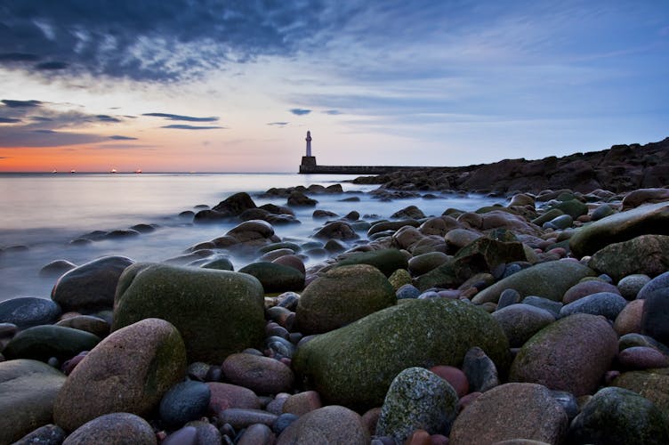 Photo of lighthouse in Aberdeen at beautiful sunset.