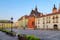 Small empty market square in Cracow, Poland in soft light of sunrise. Krakow, Maly Rynek.
