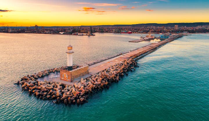 Photo of aerial view of lighthouse at sunset in Varna, Bulgaria.