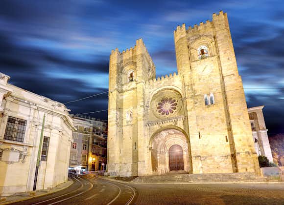 Photo of Lisbon cathedral, Alfama, Portugal at night.