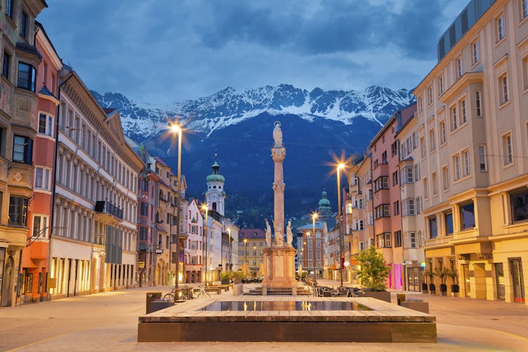 photo of Innsbruck, Austria during twilight with European Alps in the background..