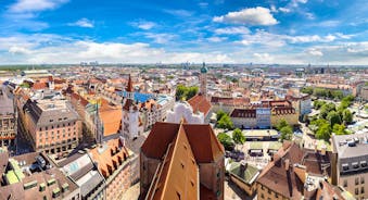 Photo of scenic summer view of the German traditional medieval half-timbered Old Town architecture and bridge over Pegnitz river in Nuremberg, Germany.