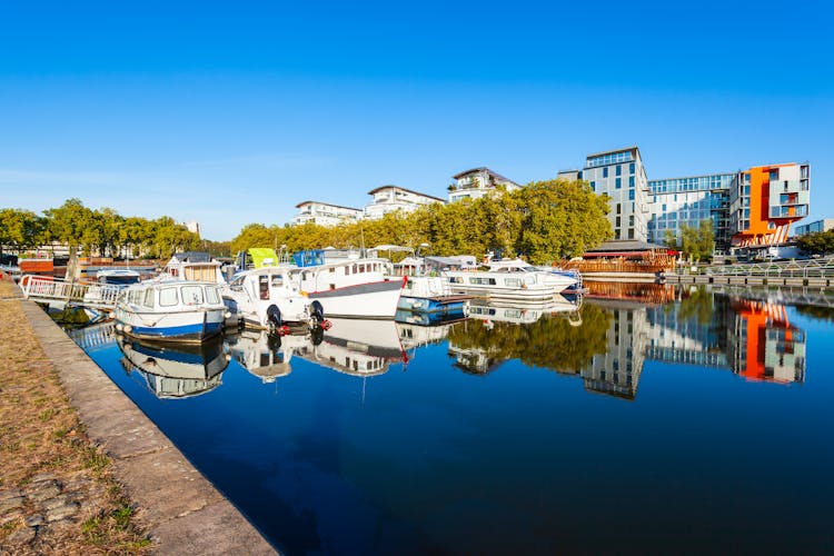 Photo of boats and yachts on the Erdre river dock in Nantes city, France.