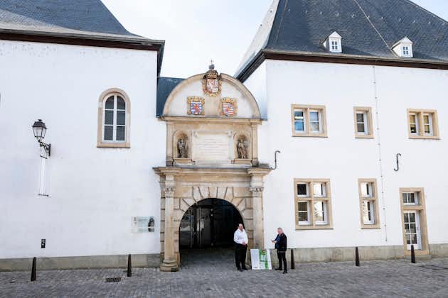 photo of Luxembourg, 23 October 2019: two men talk at the entrance of museum national history natural of Luxemburg city.