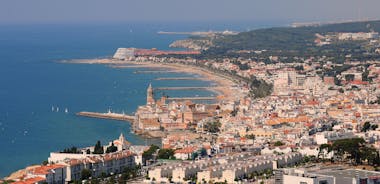 Photo of Sand beach and historical Old Town in mediterranean resort Sitges near Barcelona, Costa Dorada, Catalonia, Spain.