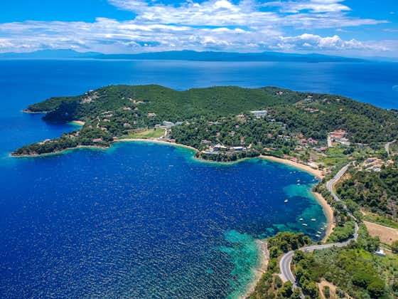 Photo of aerial view over Achladies beach in southern skiathos, Sporades, Greece.