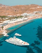 Photo of aerial view of the beautiful beach of Agios Ioannis Diakoftis on the island of Mykonos, Greece.