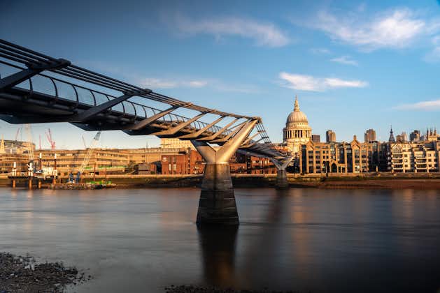 The Y shaped Millennium Bridge and St Paul's Cathedral across River Thames in UK.
