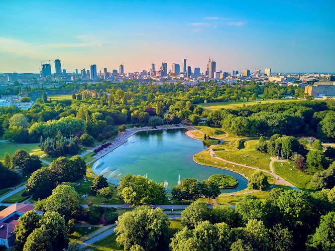 Photo of a beautiful panoramic view of the sunset in a fabulous evening from drone at Pola Mokotowskie in Warsaw.