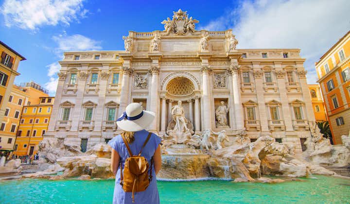 photo of famous landmark fountain di trevi in Rome, Italy during summer sunny day.