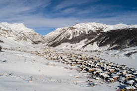 Photo of aerial view of Livigno town covered in snow in winter, Italy.