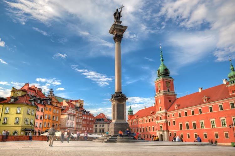 Photo of Old town in Warsaw, Poland. The Royal Castle and Sigismund's Column called Kolumna Zygmunta.