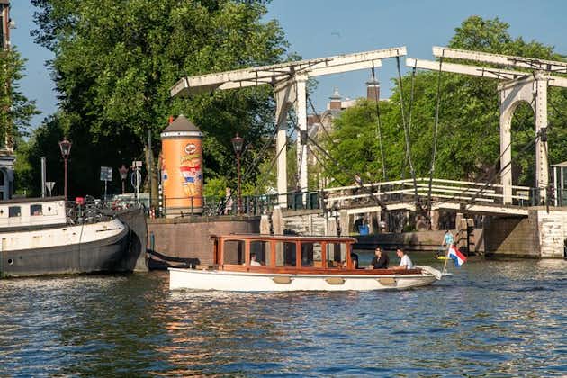 Paseo privado en barco por Ámsterdam - 90 min incl. bebida de bienvenida en el histórico barco de salón