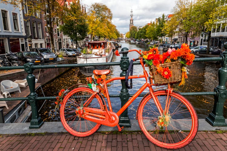  Amsterdam, the Netherlands - October 14, 2021: Canals and typical dutch architecture 