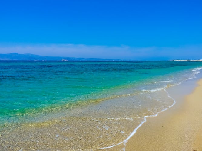 Photo of beautiful Plaka beach in Naxos Island, Cyclades, Greece.