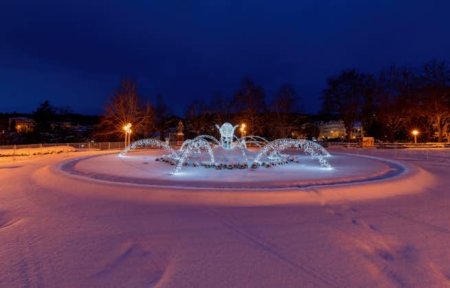 Photo of Singing fountain under snow in winter in spa town Marianske Lazne (Marienbad) ,Czech Republic.