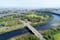 Photo of aerial view of Aberdeen as River Dee flows in a curve to the North Sea showing Duthie Park with bridge and traffic from south.