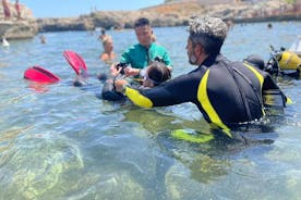 Experiencia de buceo con bautismo en el mar en Polignano a Mare