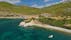 photo of view ofAerial drone photo of beautiful sandy bay and picturesque small chapel of Agios Fokas in island of Skiros, Sporades, Greece,Parikia greece.