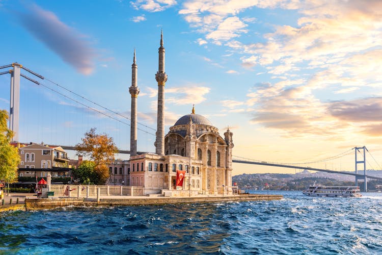 Photo of Bosphorus Bridge and the Ortakoy Mosque at sunset, Istanbul.