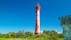 Photo of red Pakri Lighthouse found in the town of Paldiski in Estonia one of the tourist spots in the city.