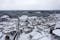 Photo of panoramic aerial view of the small Latvian town of Kandava on a snowy winter day.