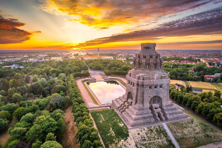 Photo of panoramic view over the city of Leipzig with the Monument to the Battle of the Nations at sunset.