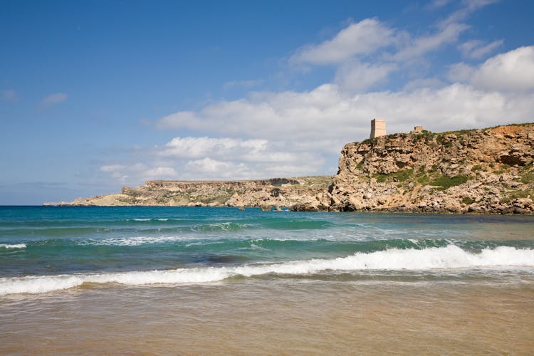 Photo of the beach of Ghajn Tuffieha Bay in Manikata, Malta.